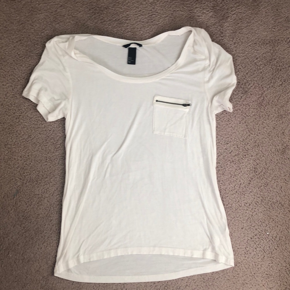 White tee with zipper pocket